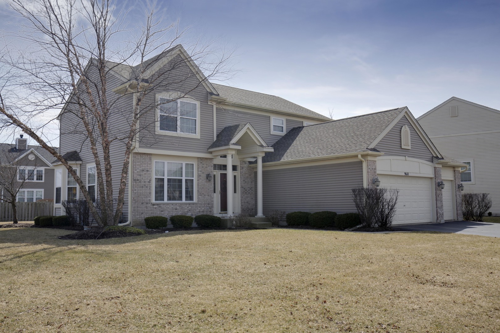 9610 Newton Road Huntley, IL 60142 - Photo 2 of 23 a view of a house with a yard