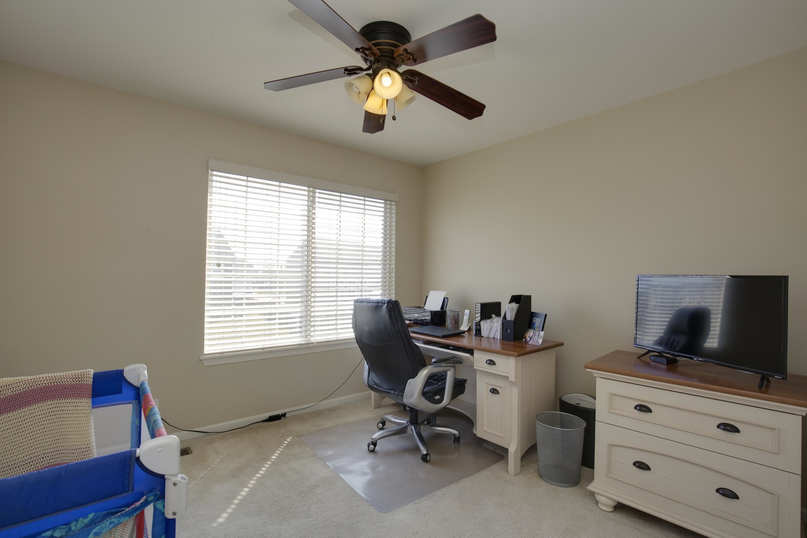 9610 Newton Road Huntley, IL 60142 - Photo 15 of 23 a room with furniture and window