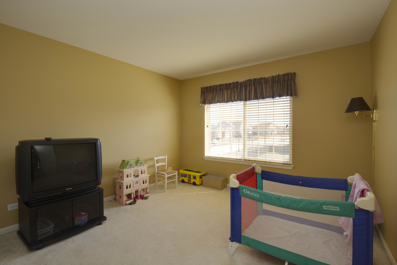9610 Newton Road Huntley, IL 60142 - Photo 17 of 23 a living room with furniture and a window