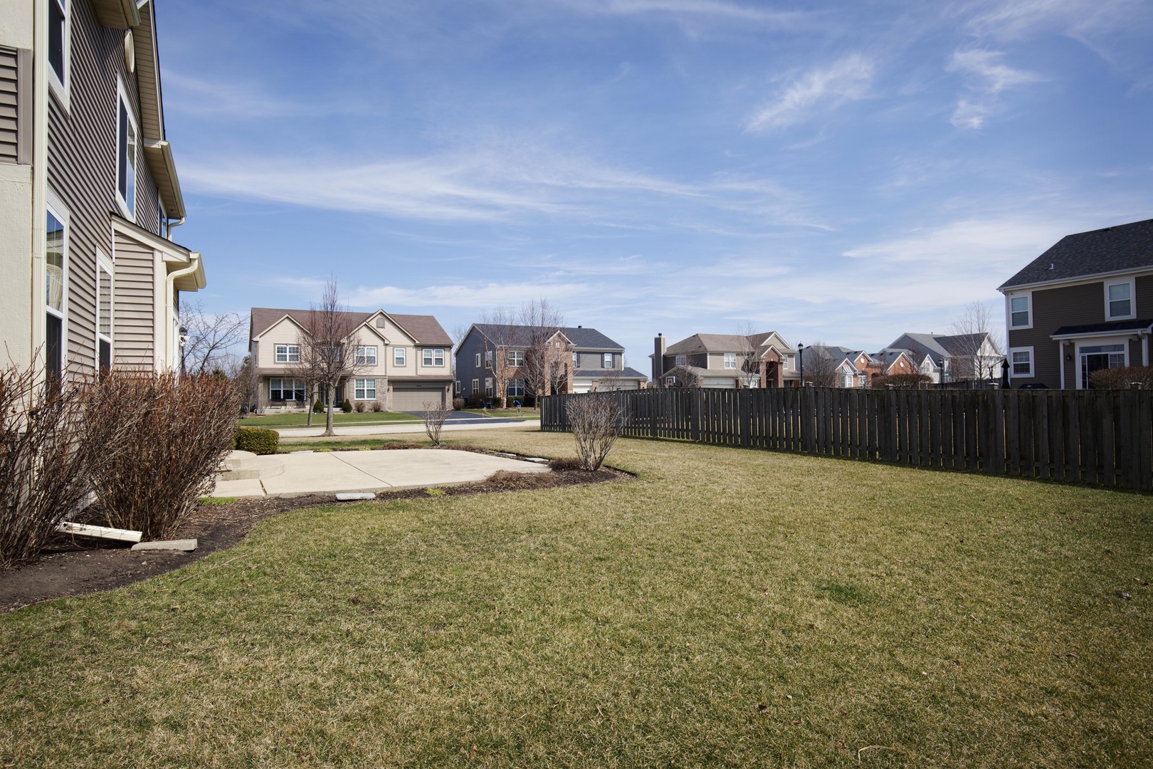 9610 Newton Road Huntley, IL 60142 - Photo 22 of 23 a swimming pool with outdoor seating and yard
