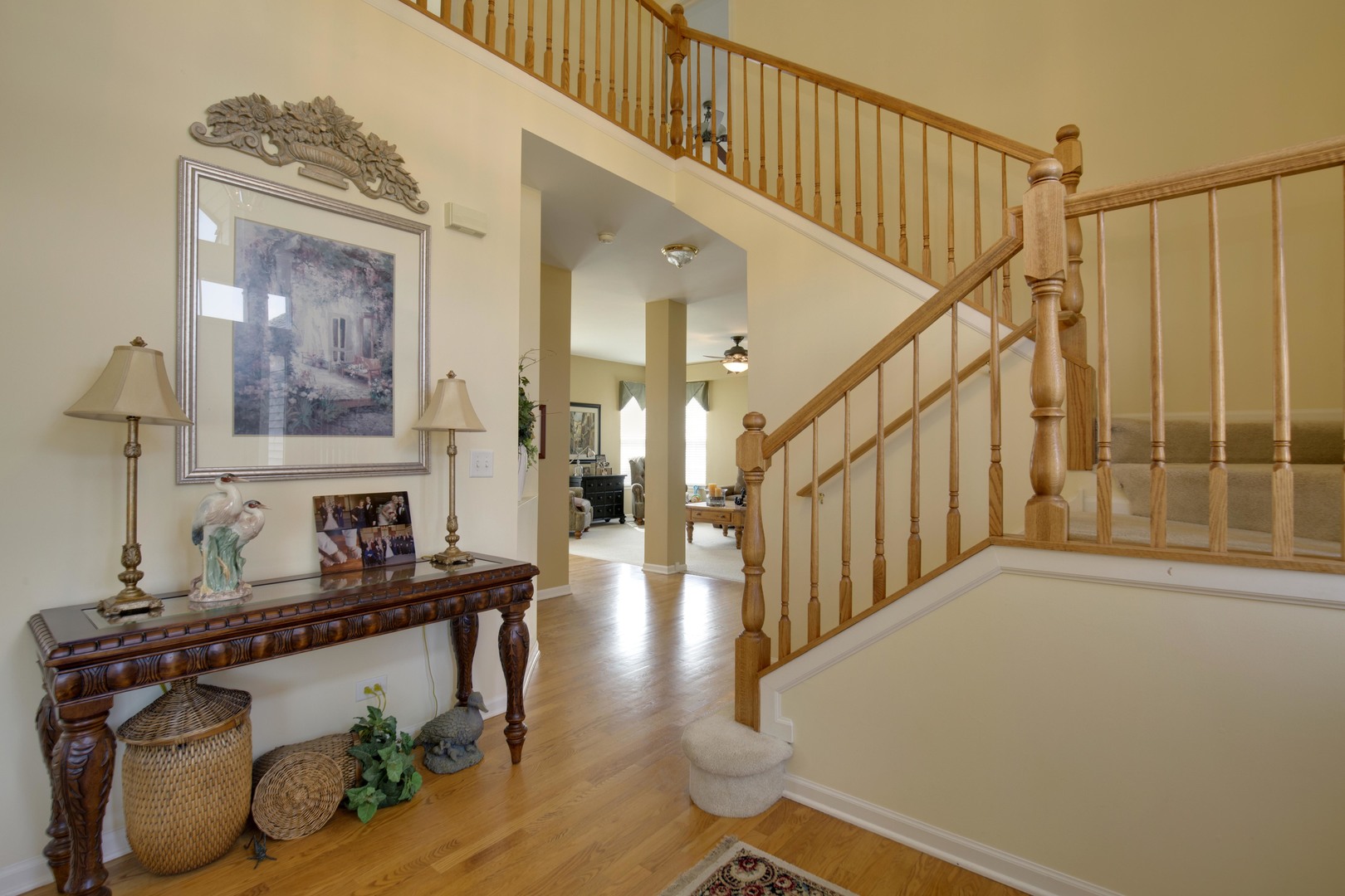9610 Newton Road Huntley, IL 60142 - Photo 4 of 23 a view of entryway and hall with wooden floor