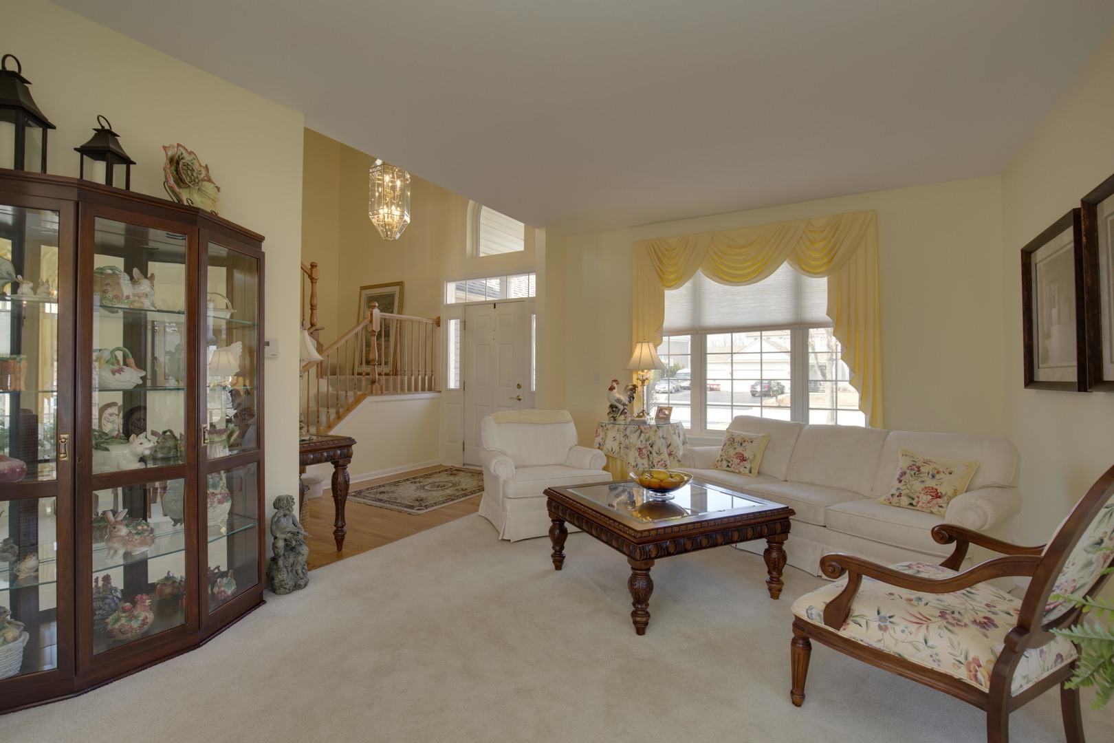 9610 Newton Road Huntley, IL 60142 - Photo 5 of 23 a living room with furniture a rug and a window