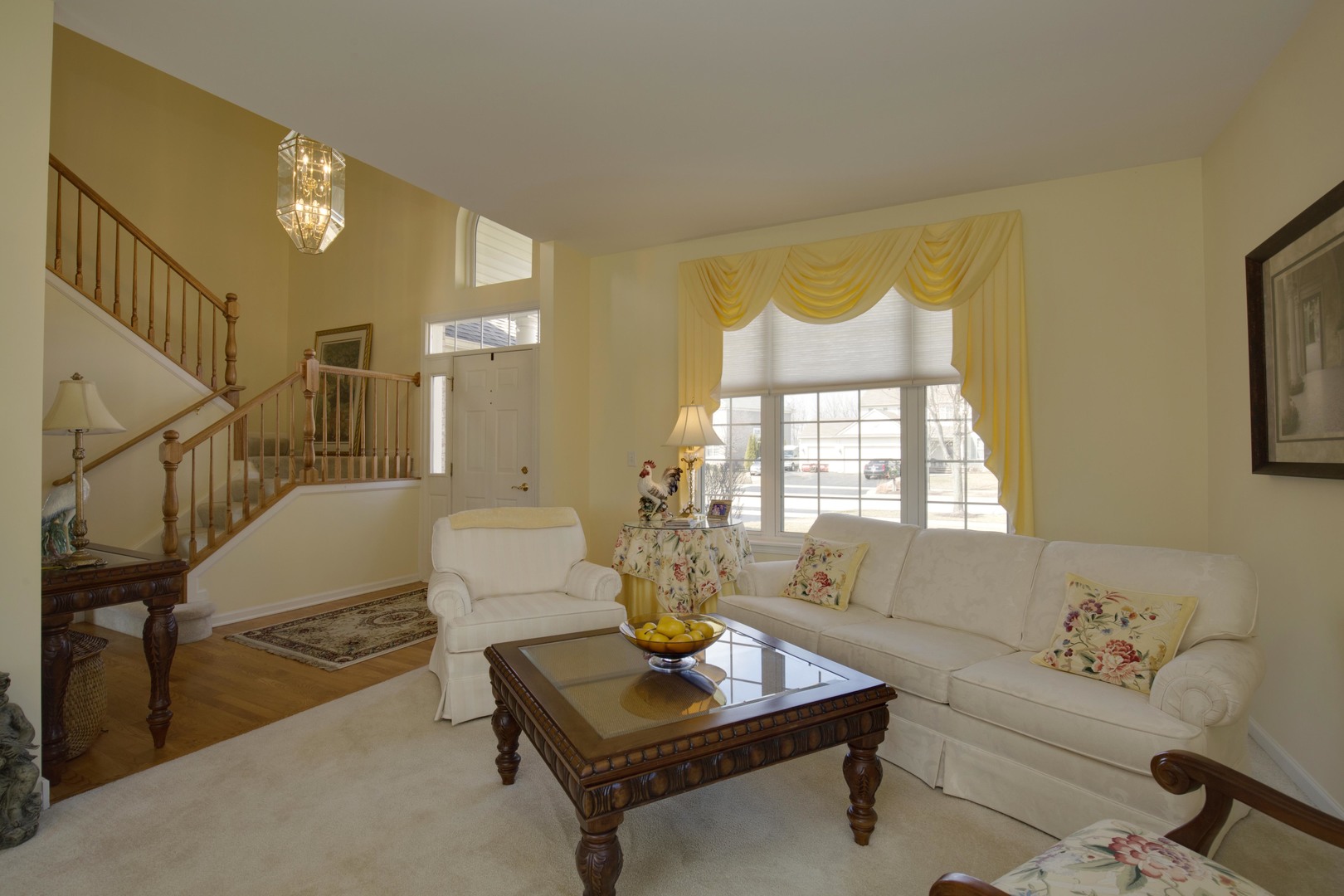 9610 Newton Road Huntley, IL 60142 - Photo 6 of 23 a living room with furniture and a potted plant