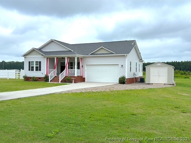 a view of a house with a big yard and a large tree