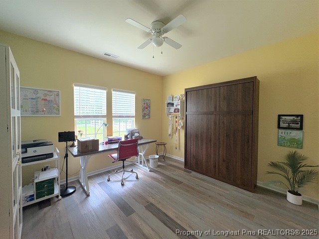893 Blanchard Road St. Pauls, NC 28384 - Photo 17 of 32 a living room with furniture and a wooden floor