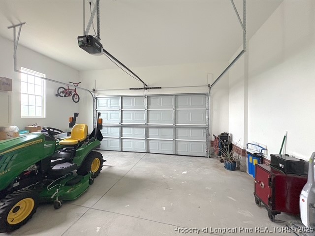 893 Blanchard Road St. Pauls, NC 28384 - Photo 27 of 32 a living room with furniture and a gym machine