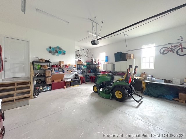 893 Blanchard Road St. Pauls, NC 28384 - Photo 28 of 32 a play room with furniture and a garage