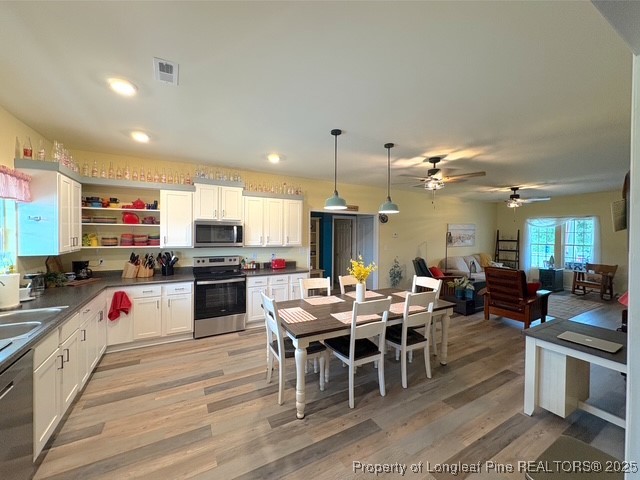 893 Blanchard Road St. Pauls, NC 28384 - Photo 8 of 32 a kitchen with lots of counter top space and stainless steel appliances