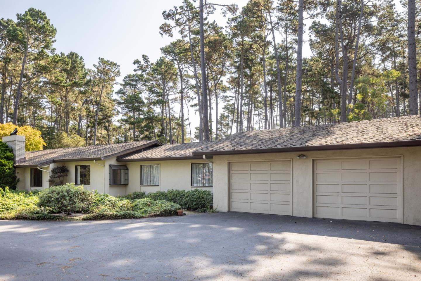 3171 Forest Lake Road Pebble Beach, CA 93953 - Photo 3 of 17 a view of a house with a backyard