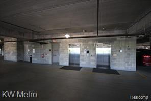 350 North Main Street, Unit 716 Royal Oak, MI 48067 - Photo 30 of 35 FOB Entry Elevators in parking deck