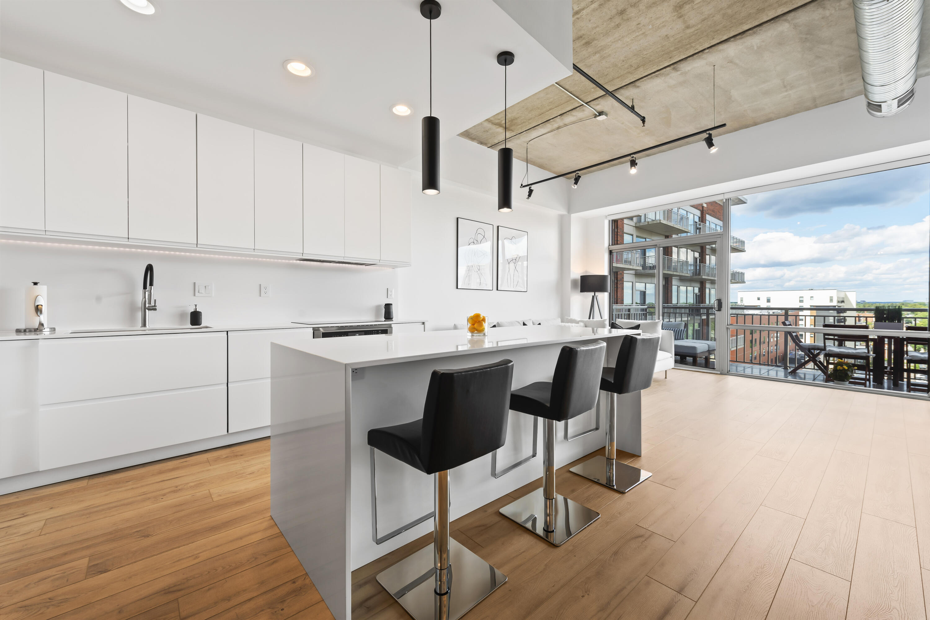 350 North Main Street, Unit 716 Royal Oak, MI 48067 - Photo 4 of 35 Kitchen Island- seats 3