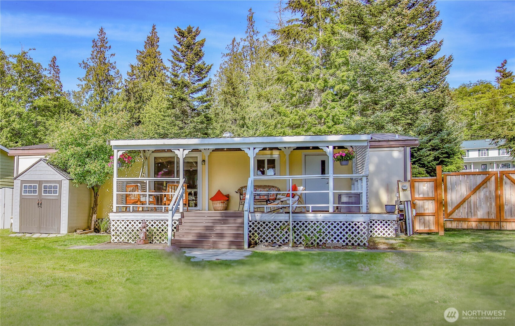 3276 East Harbor Road Langley, WA 98260 - Photo 1 of 37 a view of a house with a patio