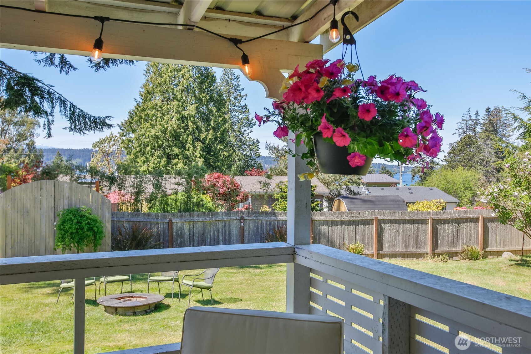 3276 East Harbor Road Langley, WA 98260 - Photo 11 of 37 a view of a swimming pool with a patio