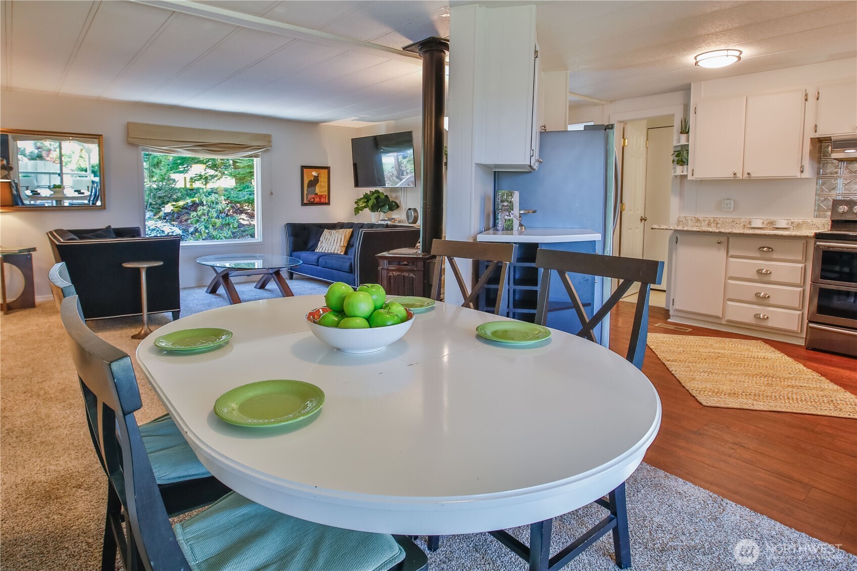 3276 East Harbor Road Langley, WA 98260 - Photo 14 of 37 a view of a dining room with furniture