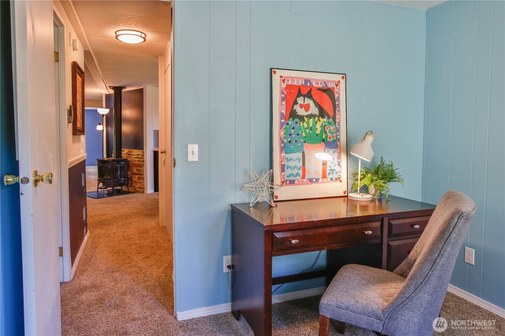 3276 East Harbor Road Langley, WA 98260 - Photo 28 of 37 a dining room with furniture and a potted plant