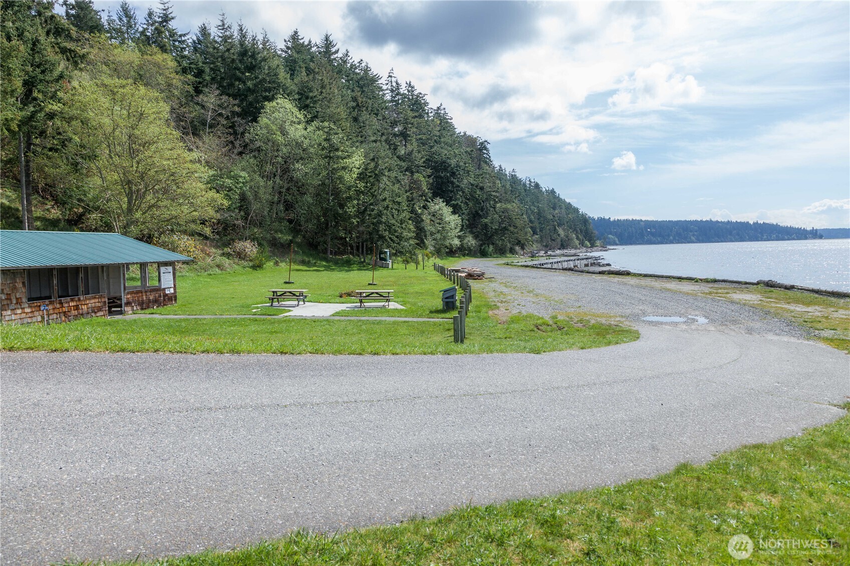3276 East Harbor Road Langley, WA 98260 - Photo 35 of 37 a view of a house with a yard and a garden