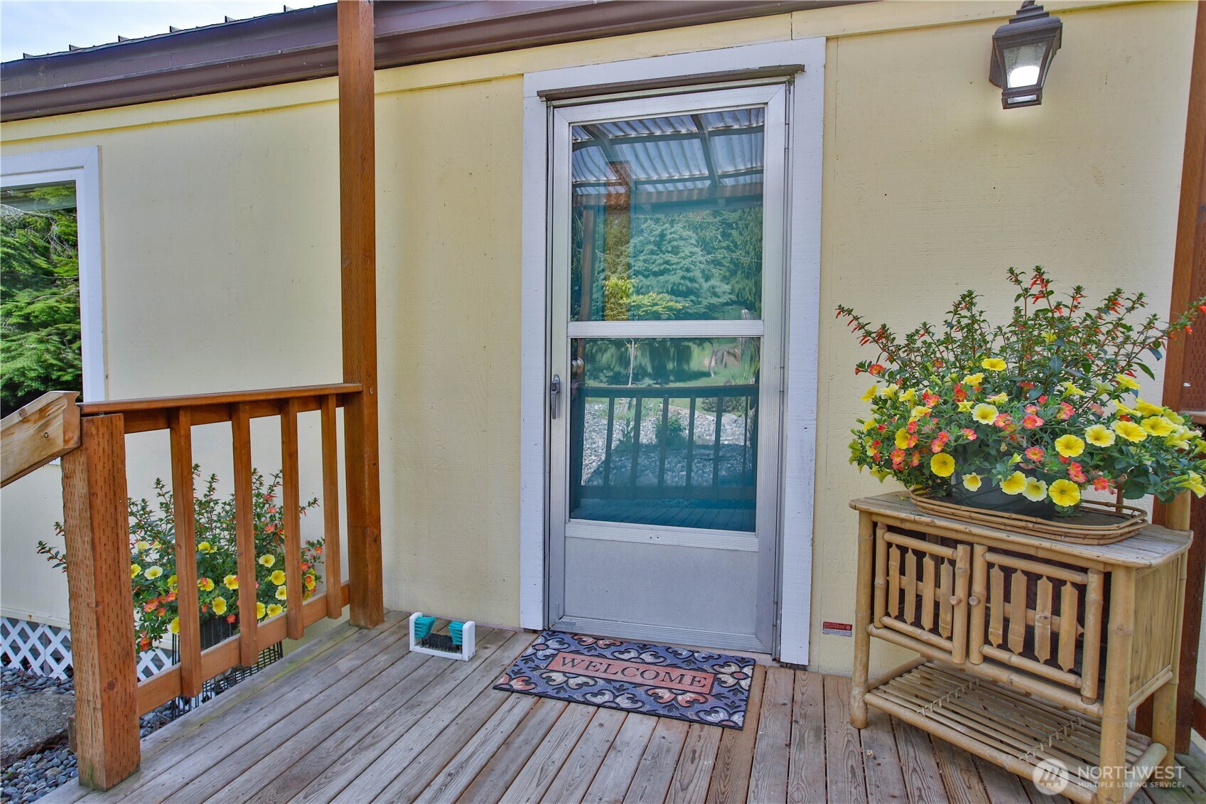 3276 East Harbor Road Langley, WA 98260 - Photo 6 of 37 a view of porch with a bench