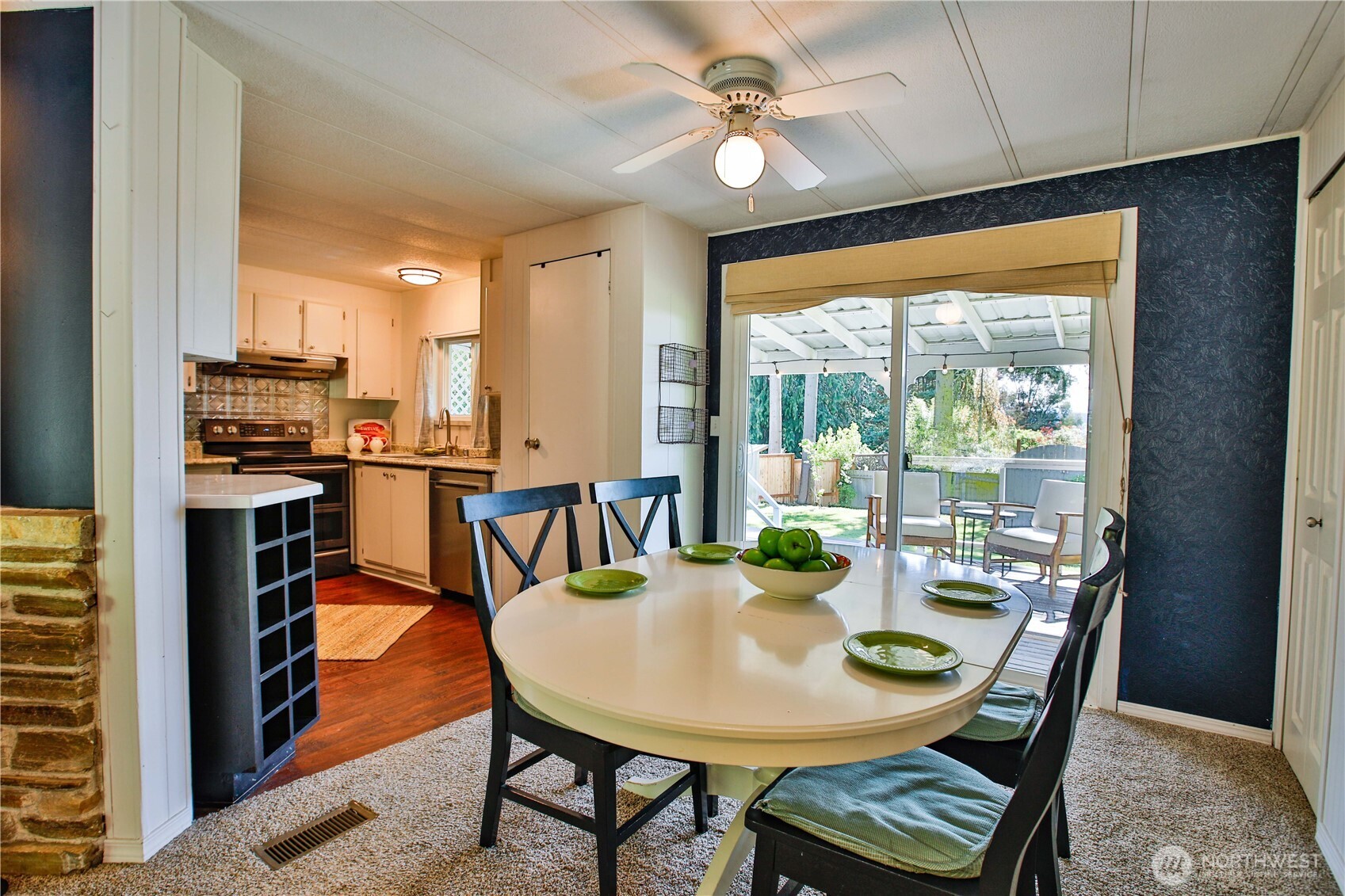 3276 East Harbor Road Langley, WA 98260 - Photo 8 of 37 a view of a dining room with furniture window and outside view