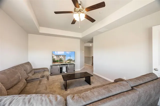 a living room with furniture and a couch