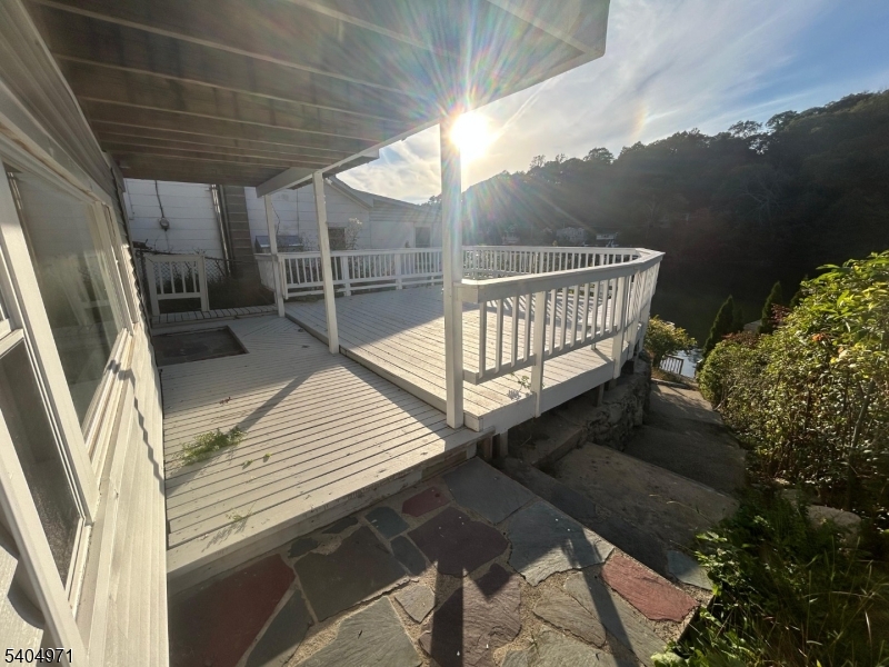 38 West River Styx Road Hopatcong, NJ 07843 - Photo 23 of 36 a view of balcony with wooden floor and fence
