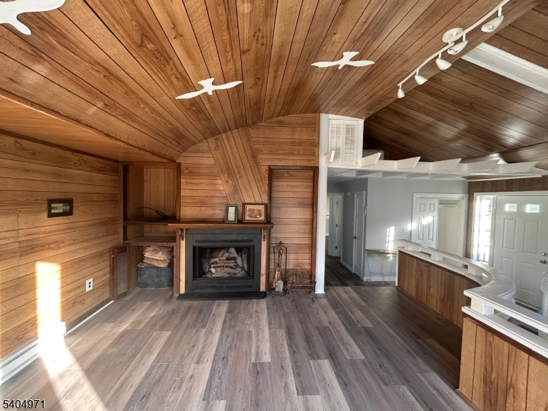 38 West River Styx Road Hopatcong, NJ 07843 - Photo 9 of 36 a view of a livingroom with a fireplace