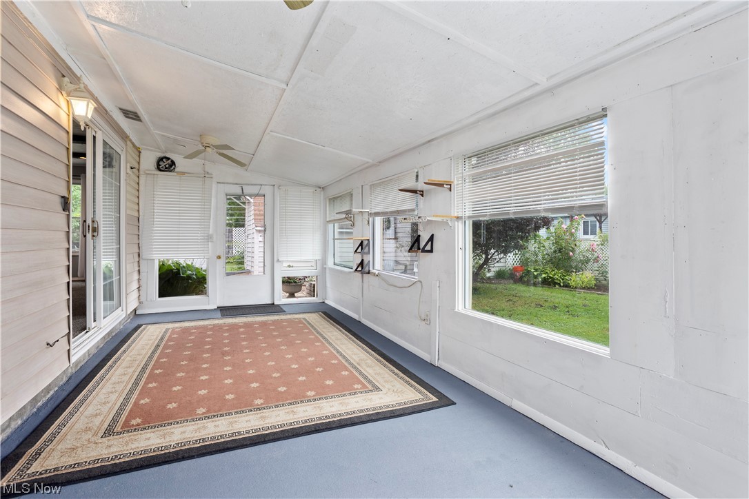 387 Fairfax Road Vermilion, OH 44089 - Photo 32 of 35 Sunroom with lofted ceiling