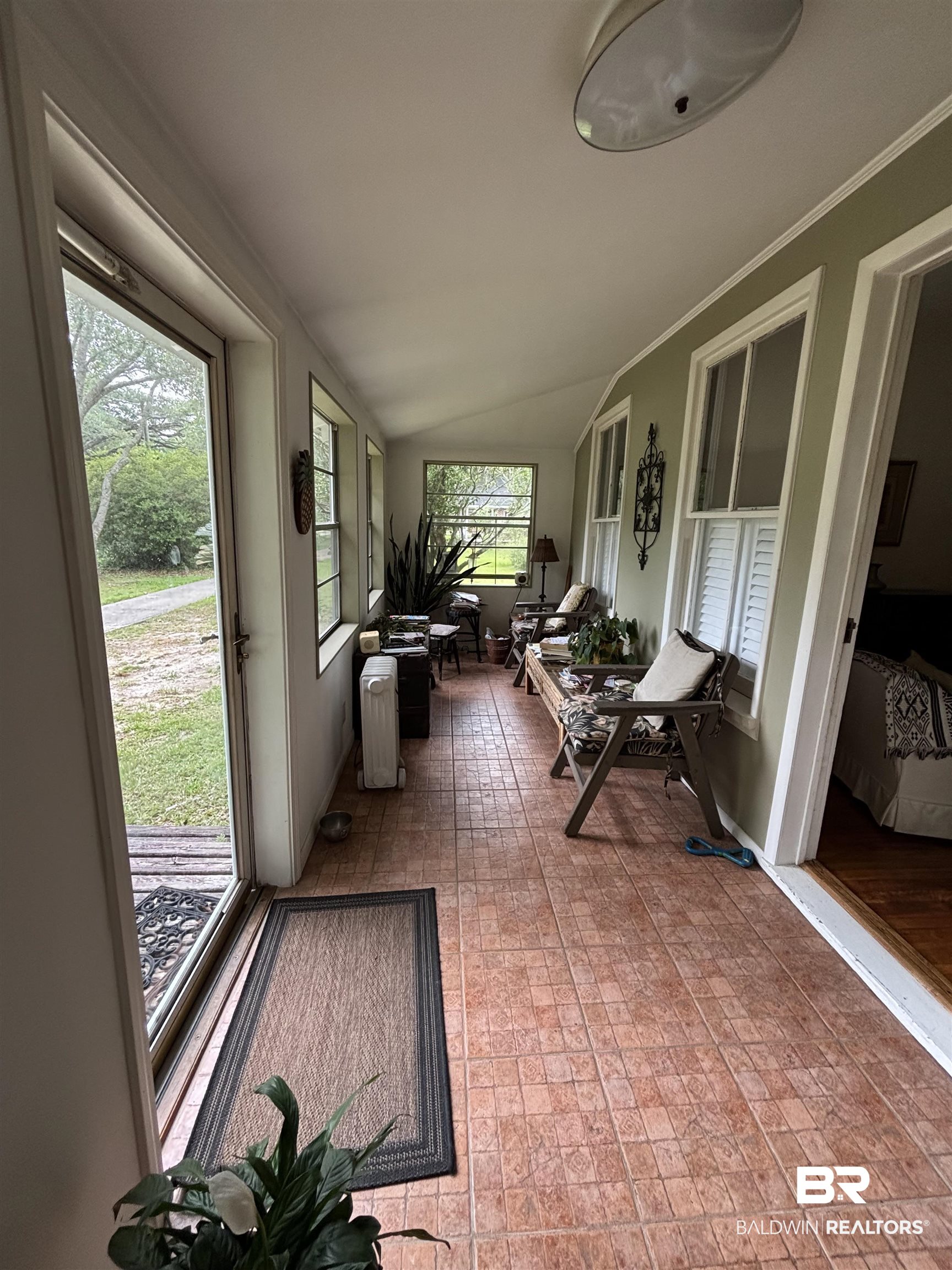 216 West Orange Avenue Foley, AL 36535 - Photo 36 of 37 Sunroom with vaulted ceiling