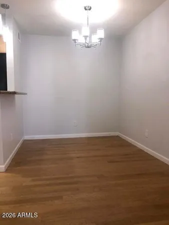 a kitchen with stainless steel appliances a stove a sink and a microwave