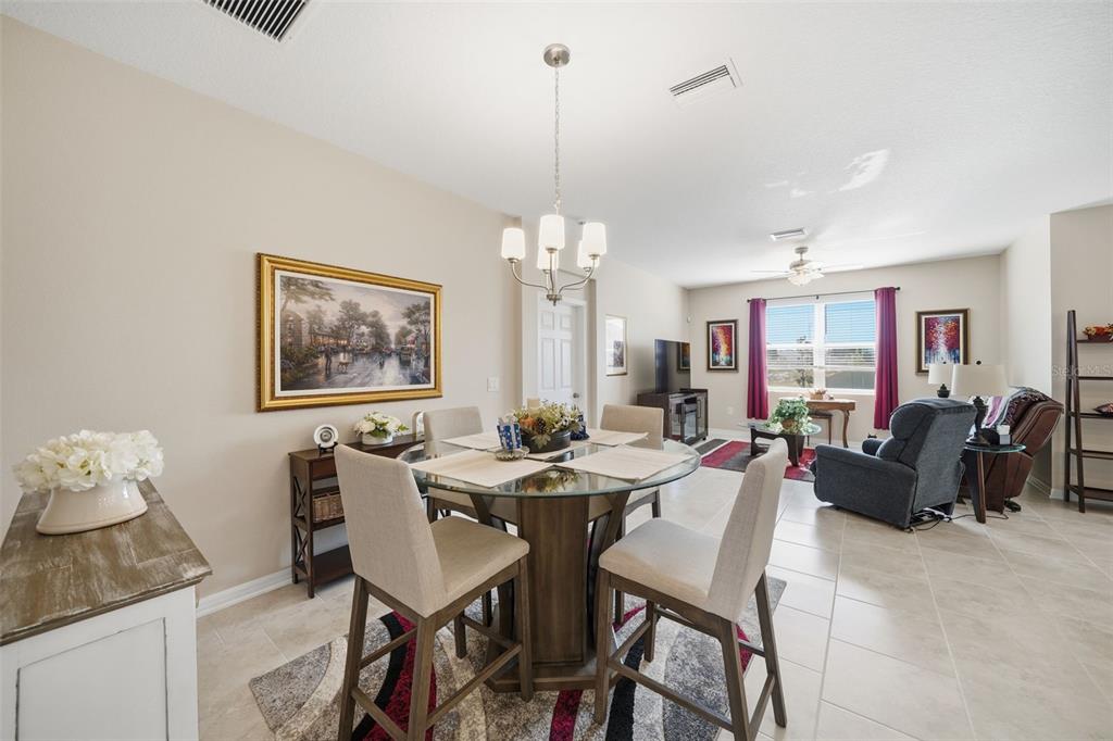 220 Hillshire Place Spring Hill, FL 34609 - Photo 17 of 18 a view of a dining room with furniture