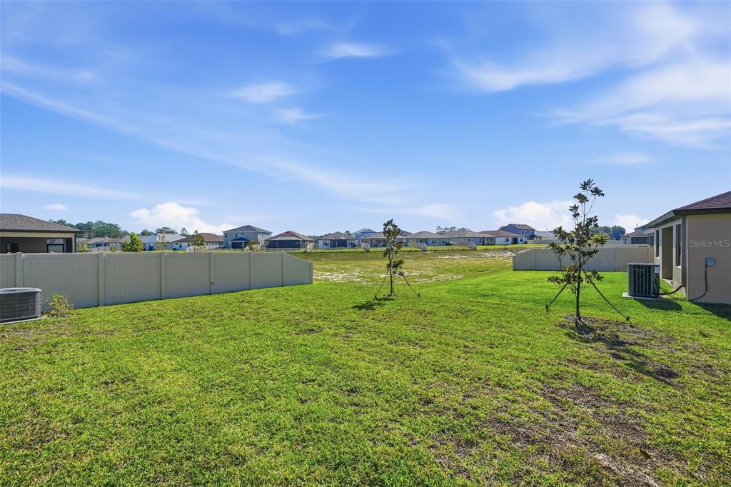 220 Hillshire Place Spring Hill, FL 34609 - Photo 6 of 18 a view of a golf course with a lake view