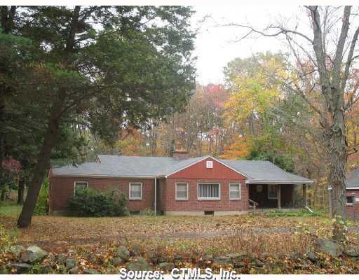 20 Shoddy Mill Road Bolton, CT 06043 - Photo 1 of 1 front view of a house with a yard