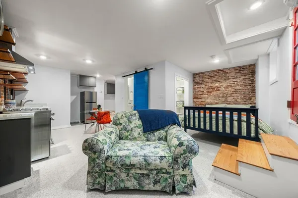 a view of a porch with wooden floor