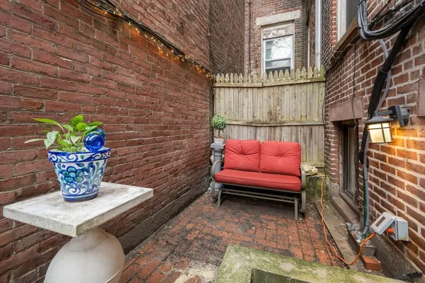 a view of a terrace with chairs
