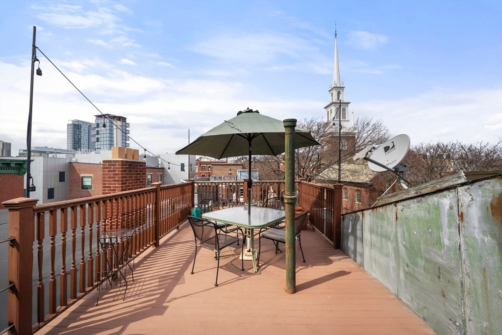 26 Unity Street, Unit 1 Boston, MA 02113 - Photo 26 of 27 a view of a terrace with sitting area