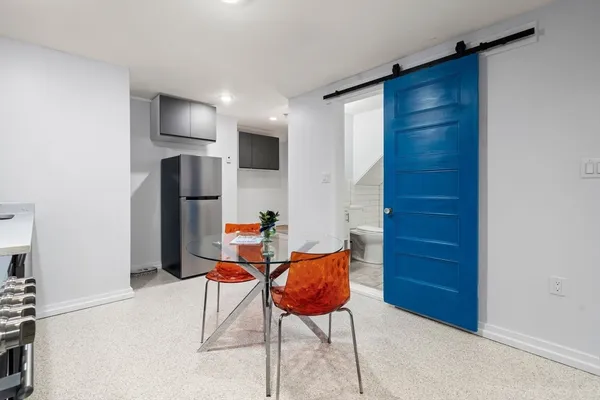 a room with furniture and a wooden floor