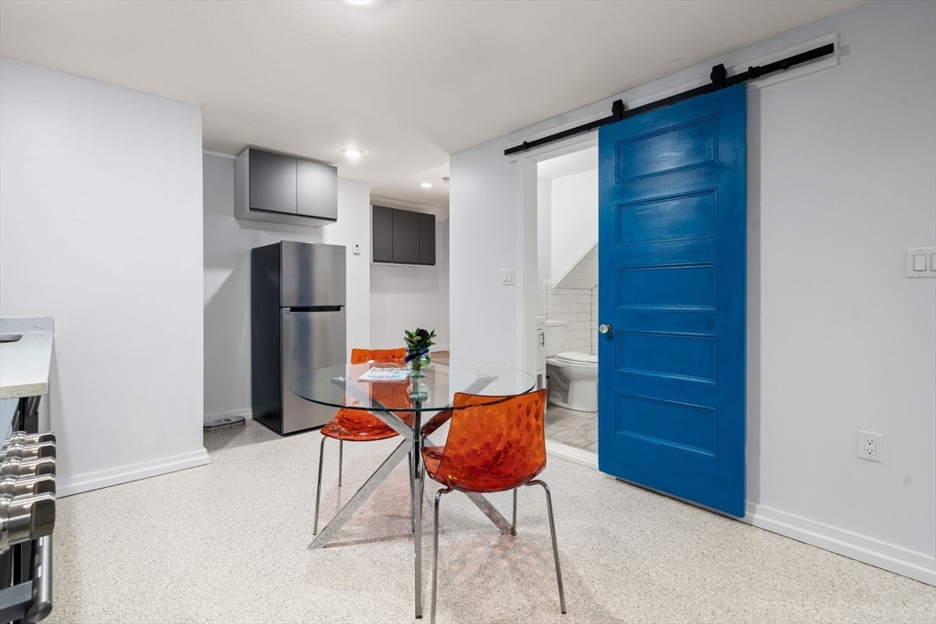 26 Unity Street, Unit 1 Boston, MA 02113 - Photo 7 of 27 a view of kitchen with furniture and refrigerator