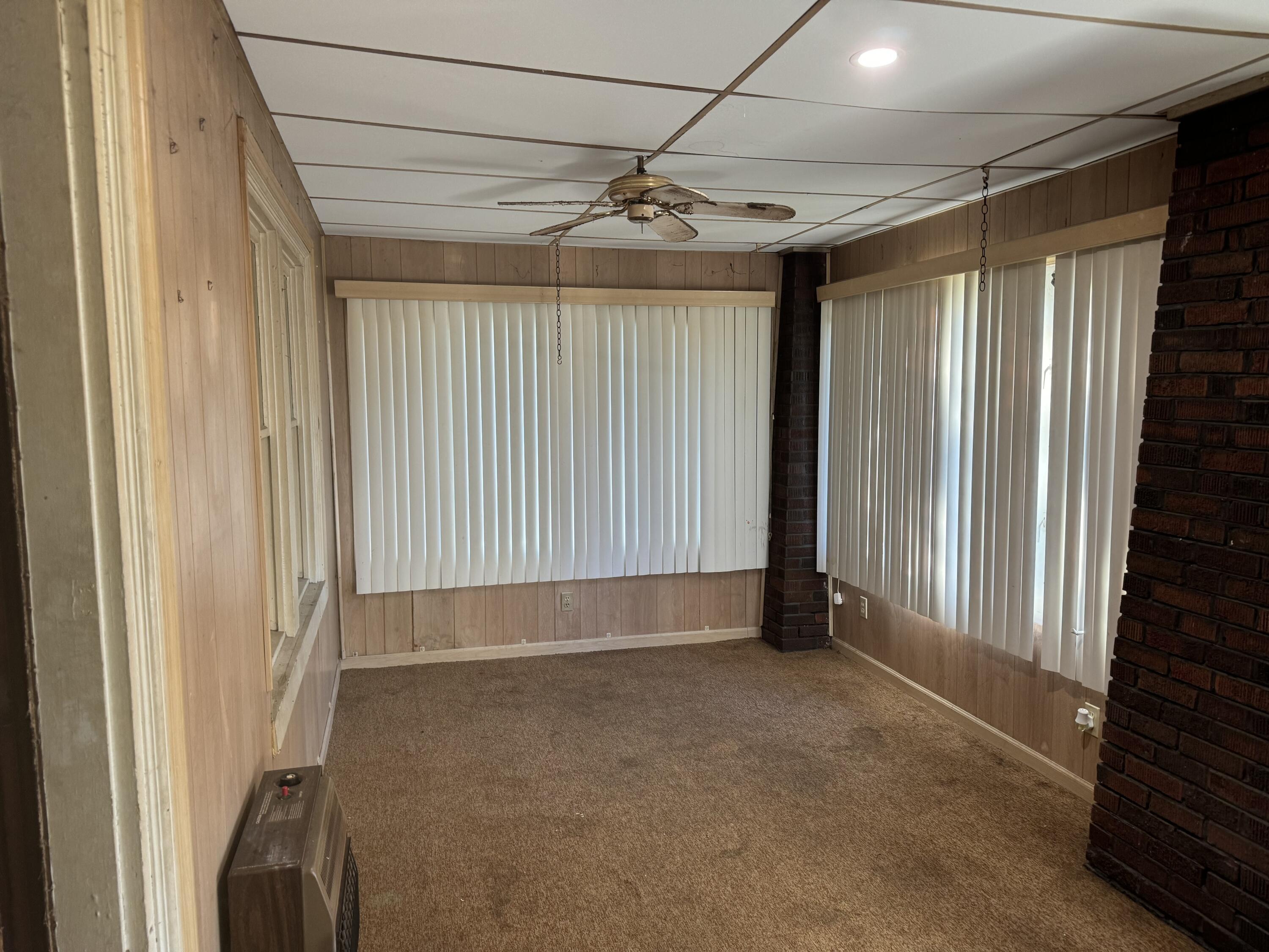 217 West Ripley Street Michigan City, IN 46360 - Photo 3 of 28 a view of an empty room with a window