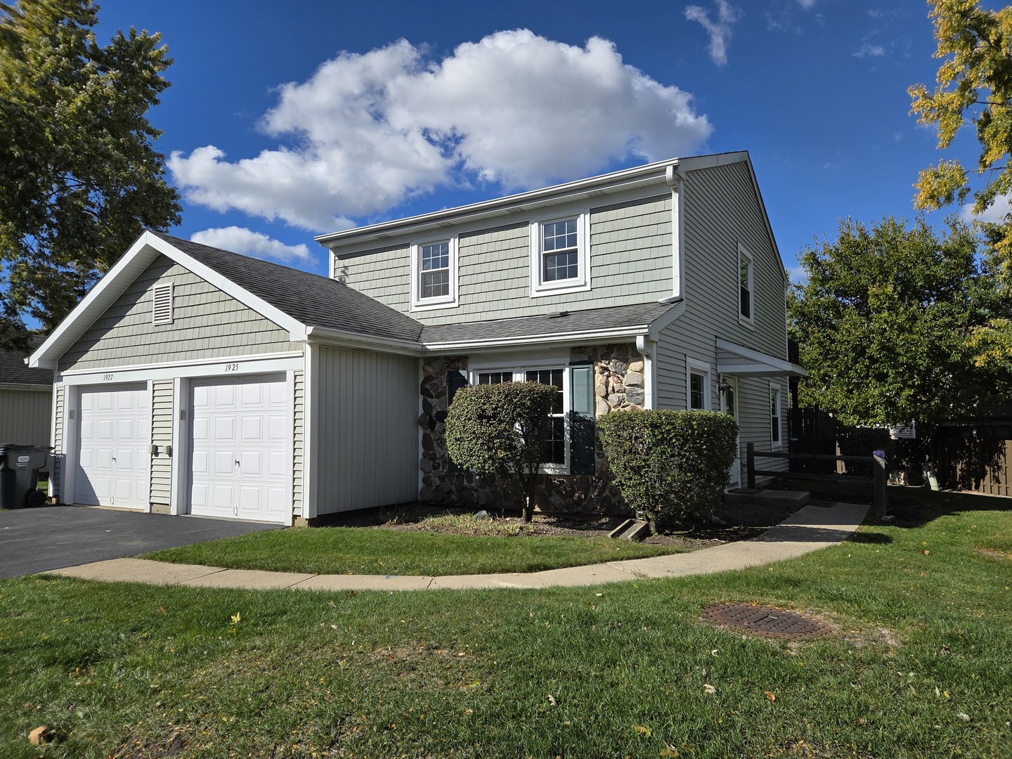 1925 Georgetown Lane Hoffman Estates, IL 60169 - Photo 1 of 29 a front view of house with yard and green space