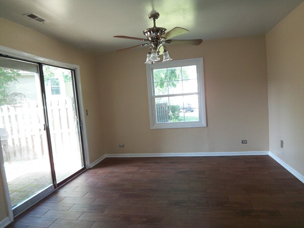 1925 Georgetown Lane Hoffman Estates, IL 60169 - Photo 13 of 29 a view of an empty room with a window