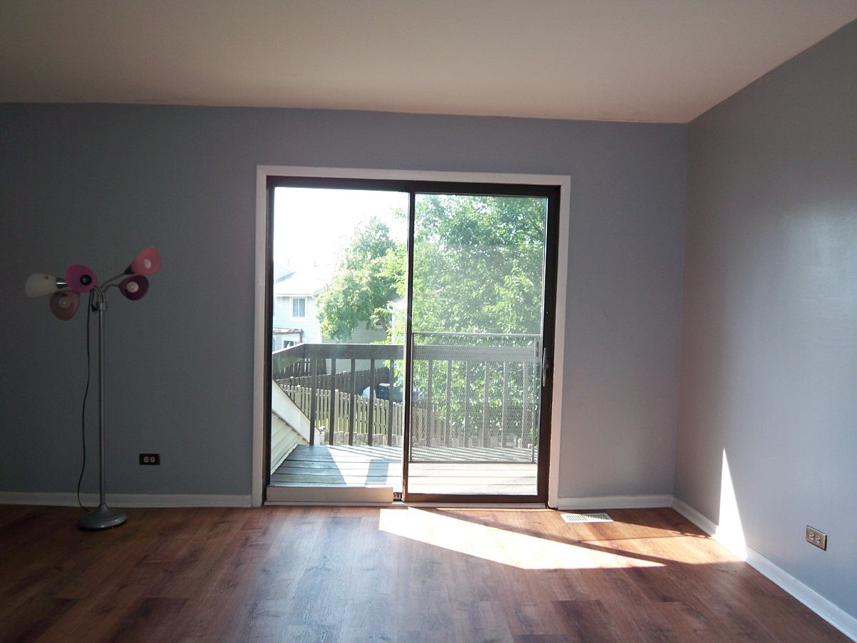 1925 Georgetown Lane Hoffman Estates, IL 60169 - Photo 20 of 29 a view of an empty room with a window