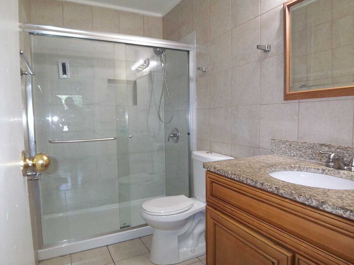 1925 Georgetown Lane Hoffman Estates, IL 60169 - Photo 27 of 29 a bathroom with a granite countertop sink toilet and shower