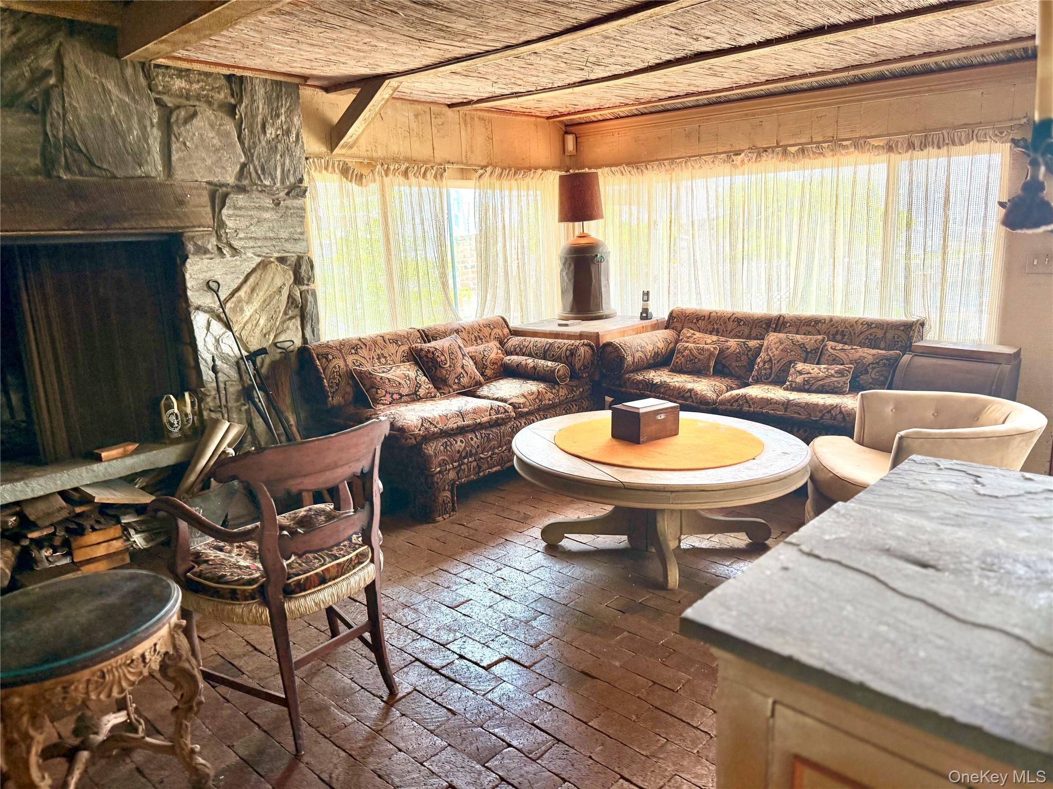335 Arthur Street Freeport, NY 11520 - Photo 4 of 17 a living room with furniture and a window