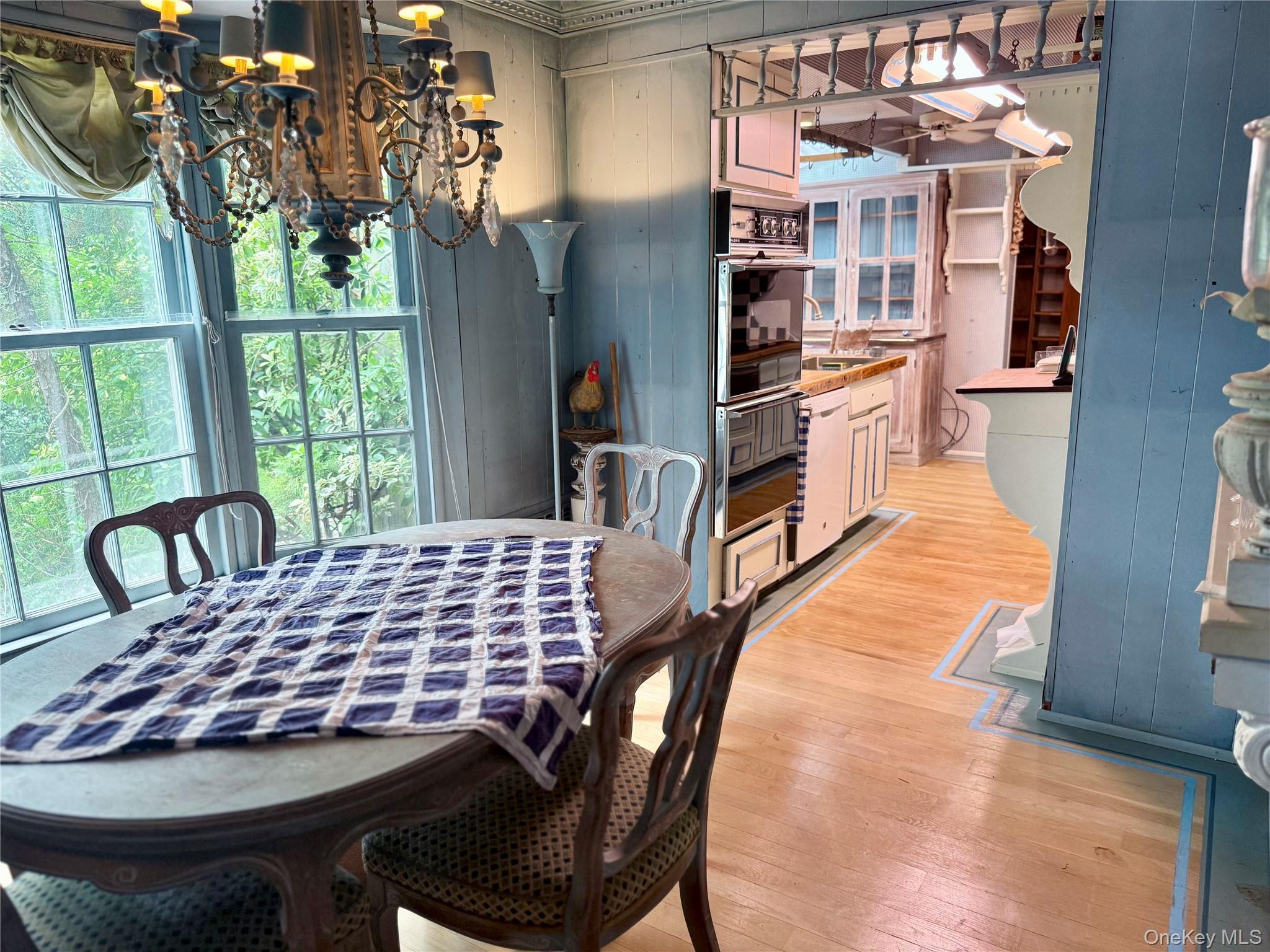 335 Arthur Street Freeport, NY 11520 - Photo 6 of 17 a view of a dining room with furniture window and outside view
