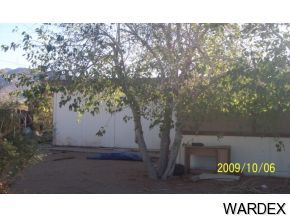 583 Bacobi Road Golden Valley, AZ 86413 - Photo 3 of 4 a black and white photo of a field
