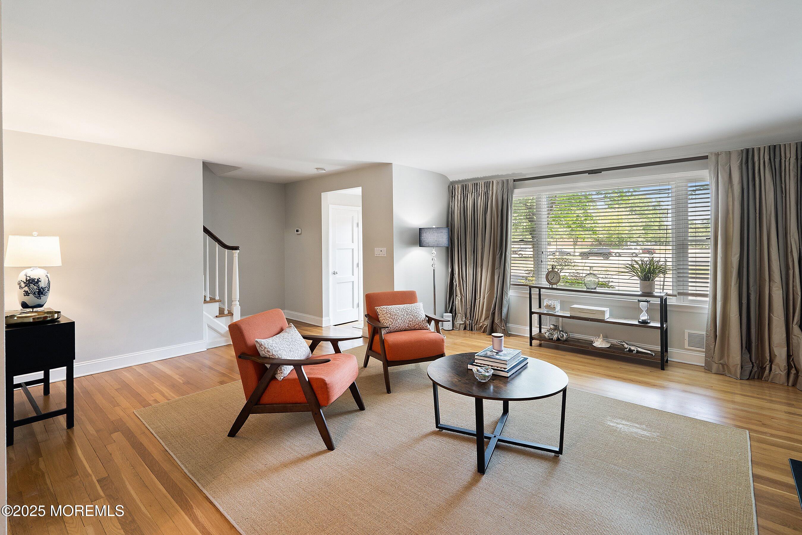 76 Ridge Road Fair Haven, NJ 07704 - Photo 4 of 22 a living room with furniture and a large window