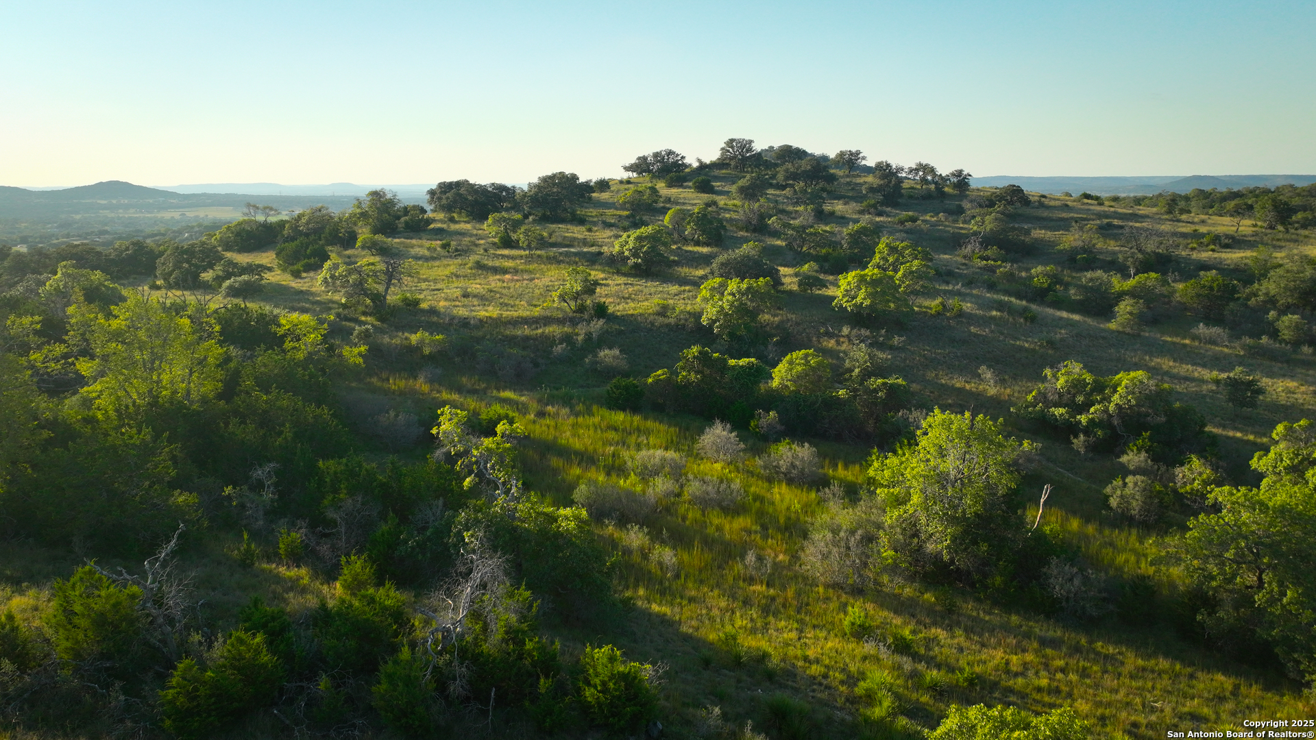 Far Hills Ranch Tract 3 Comfort, TX 78013 - Photo 13 of 19 a view of a lake with mountains in the background