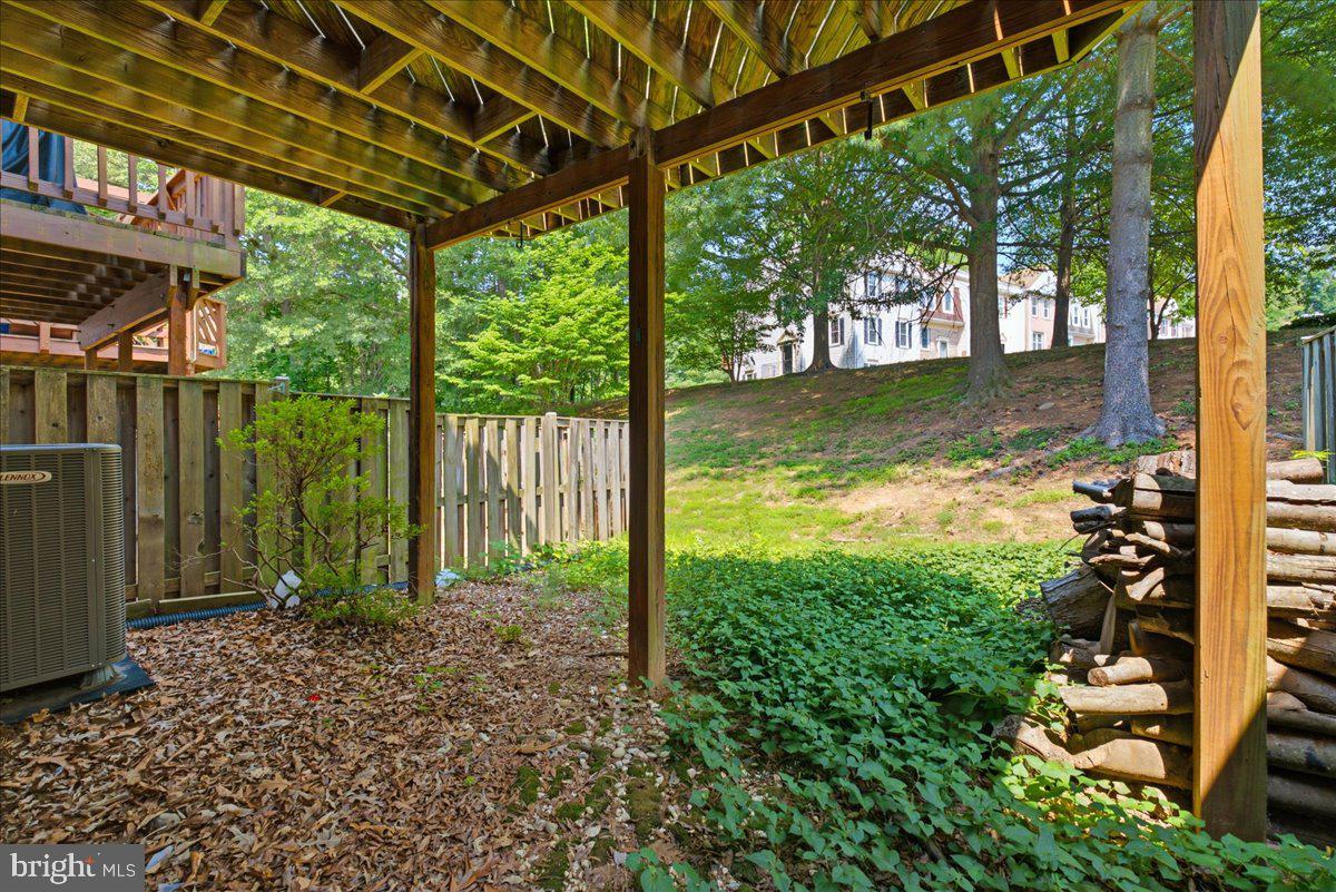 8902 Winding Hollow Way Springfield, VA 22152 - Photo 26 of 34 Covered outdoor area beneath the deck.