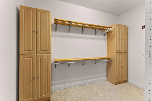 a living room with furniture a window and a fireplace