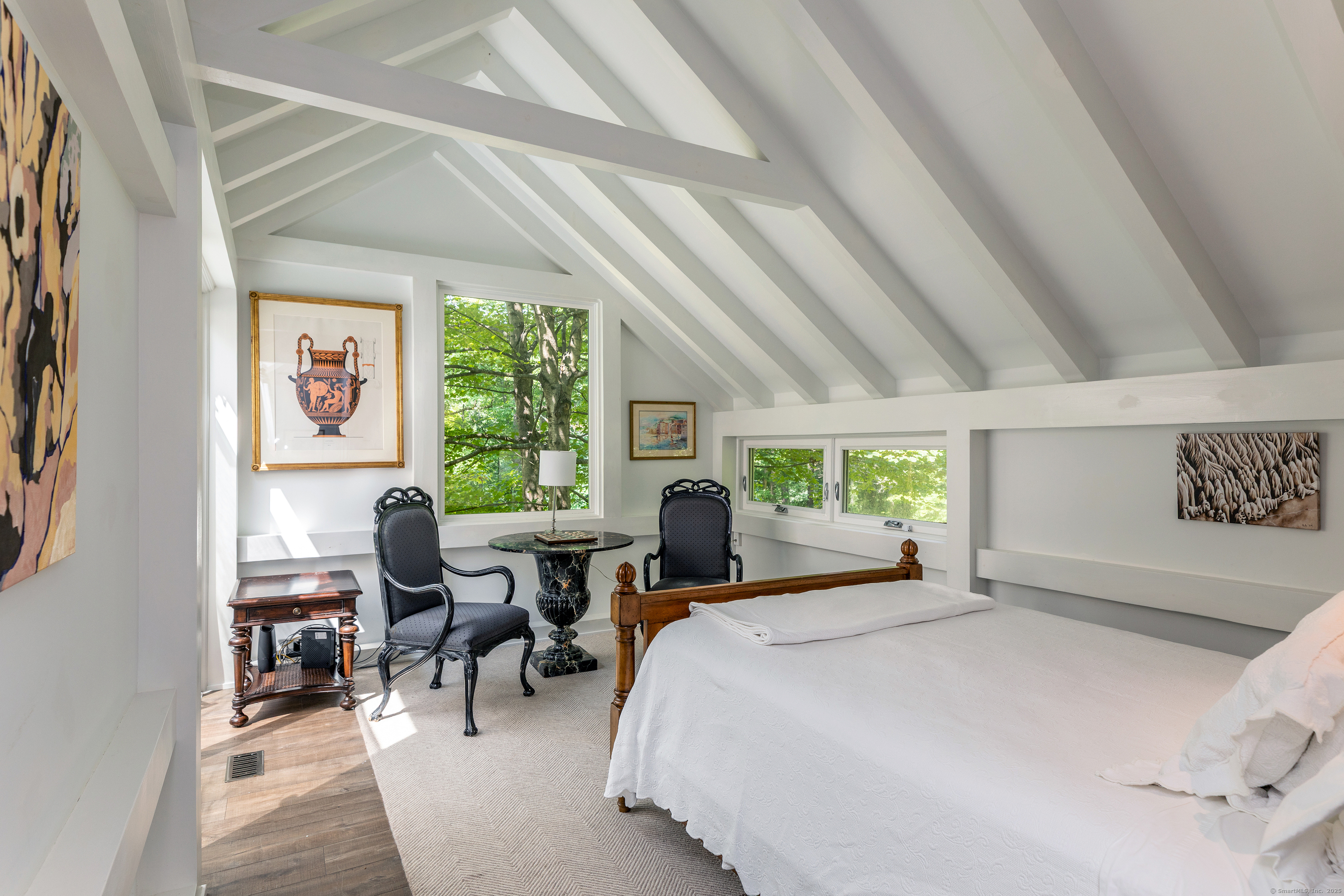 359 Nettleton Hollow Road Washington, CT 06793 - Photo 25 of 31 a bedroom with a bed and large windows