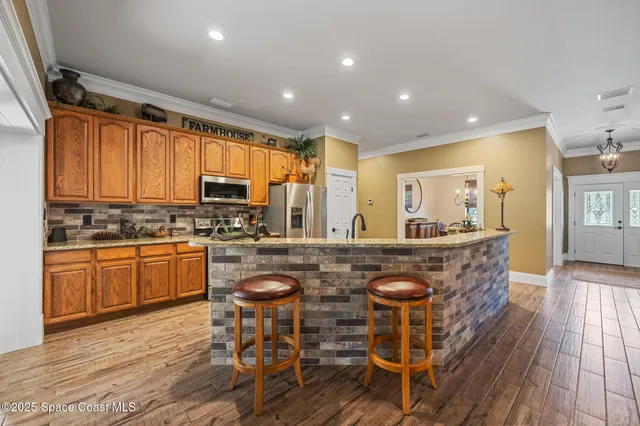a kitchen with granite countertop lots of counter top space